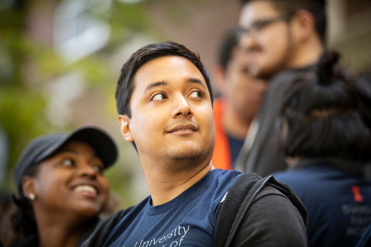 University of Illinois student looks up with a smile